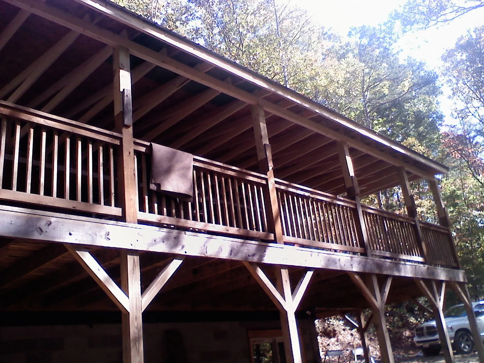 Timber framing under a new elevated porch and deck — Roof Leak Repair in Wanamingo by Roofing Brothers